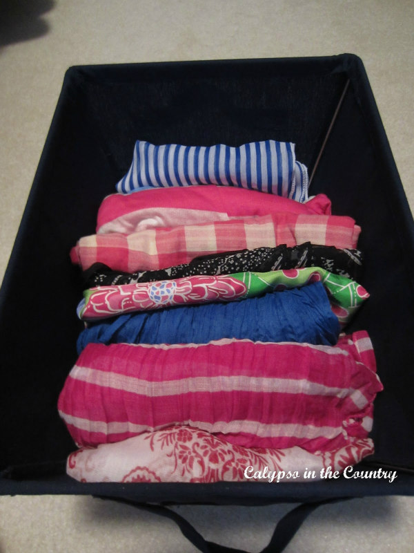 scarves in bin