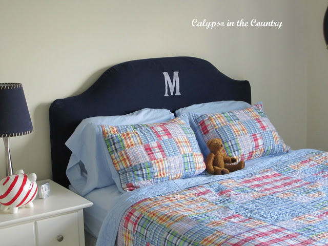 Slipcovered heardboard in boys room