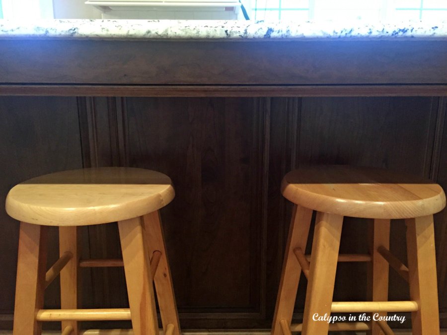 Wood counter stools at kitchen island