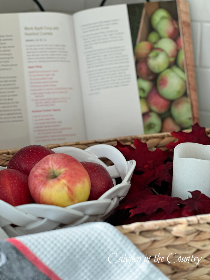 Apple cookbook and bowl of apples on tray - decorating with apples