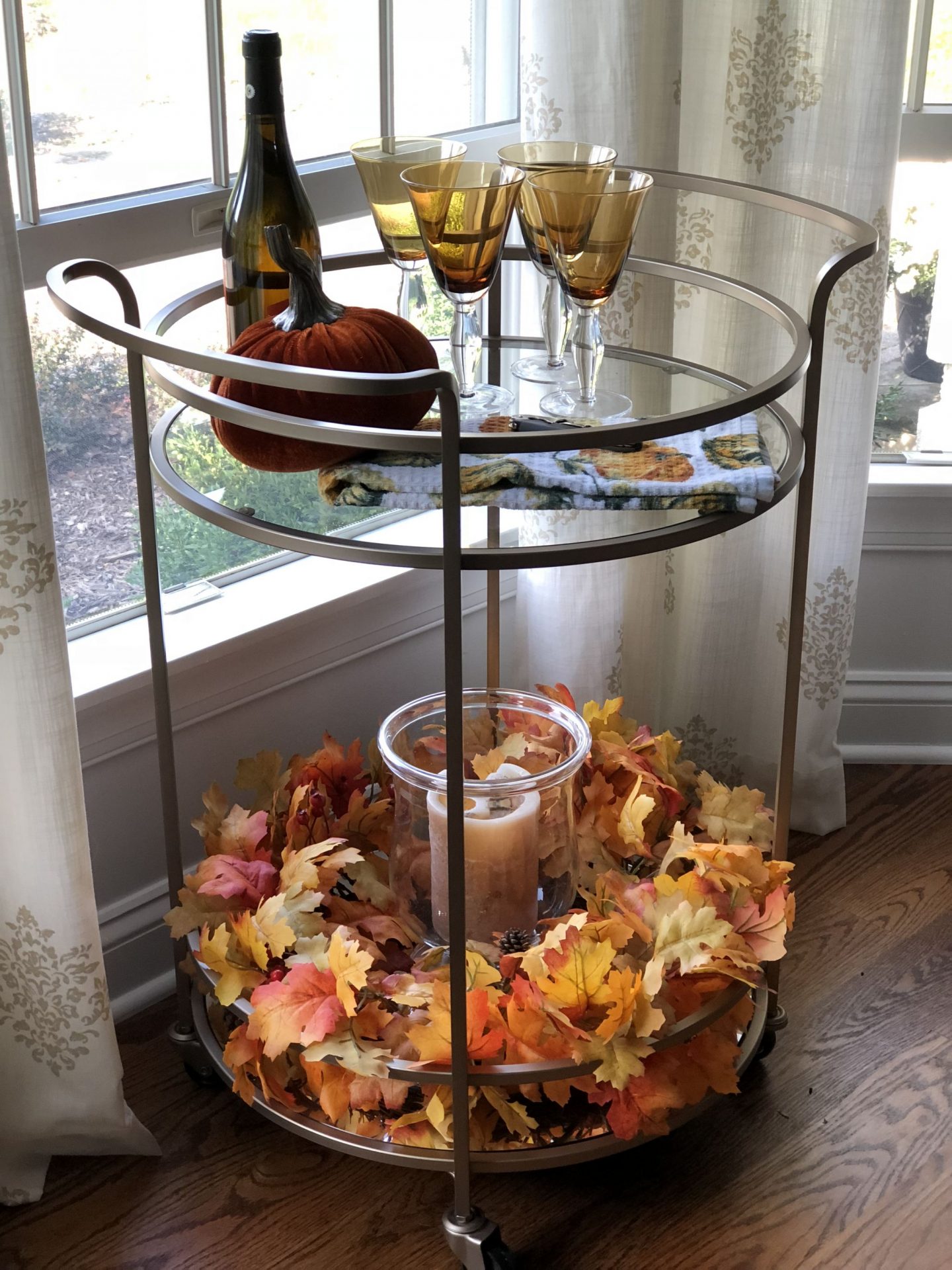 Festive gold bar cart styled for fall