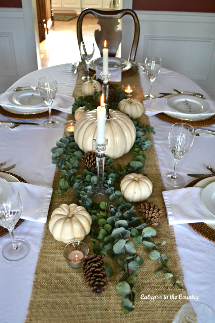 Thanksgiving Table Decorated with Burlap and White Pumpkins