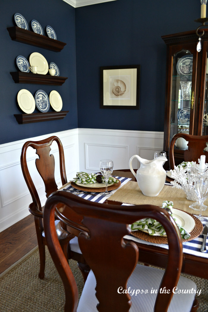 navy dining room with cherry table