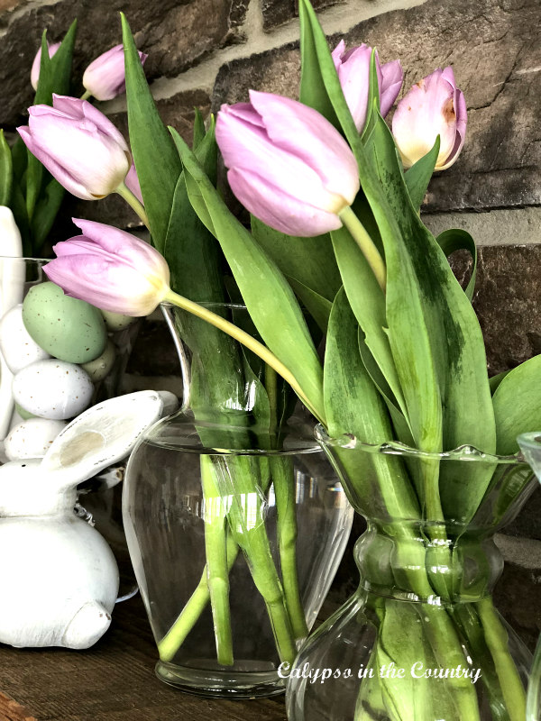 pink tulips on mantel