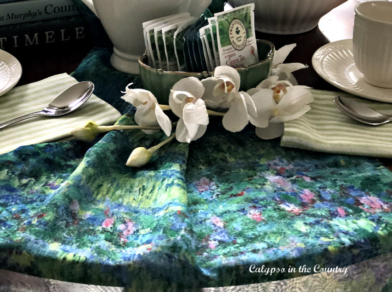 Floral scarf for tablecloth on tea table - spring afternoon tea ideas