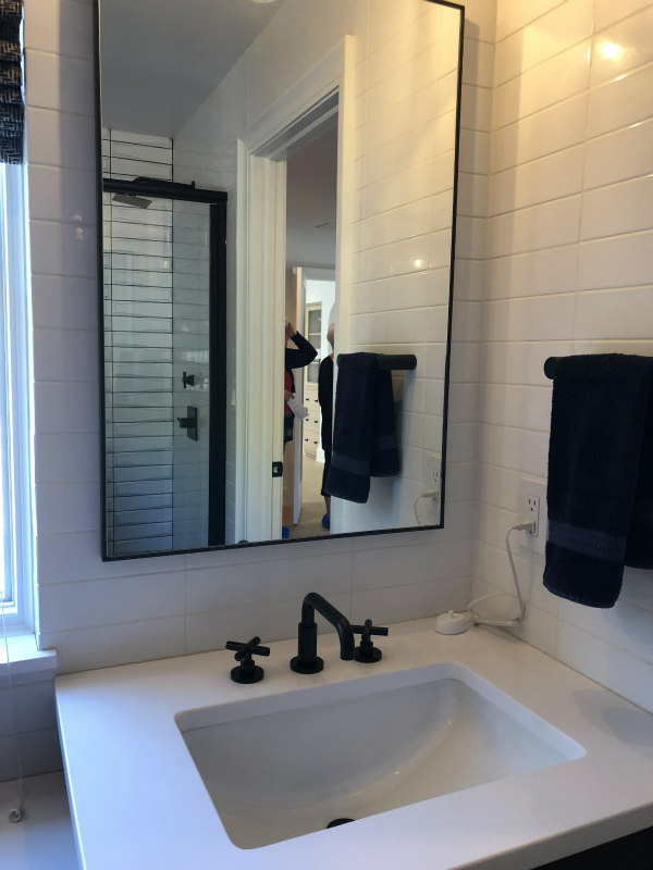 sink and mirror in boys bathroom