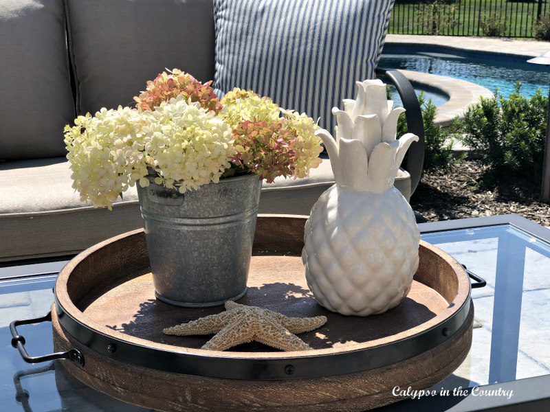 Summer to Fall decorating - outdoor coffee table vignette