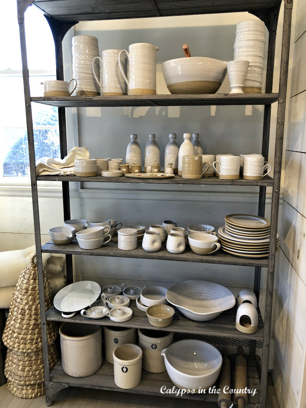 shelf of pottery seconds