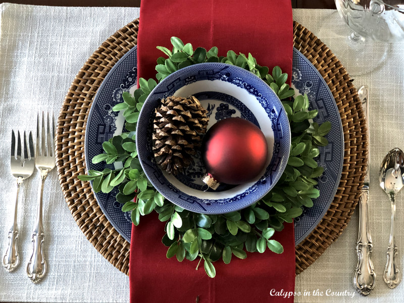 Festive Place Setting on Christmas Table in Dining Room