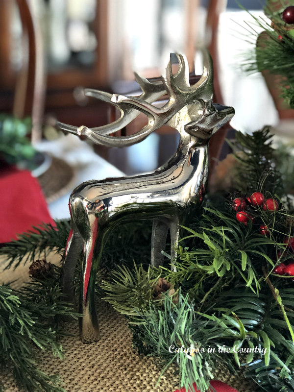 Silver reindeer on holiday table