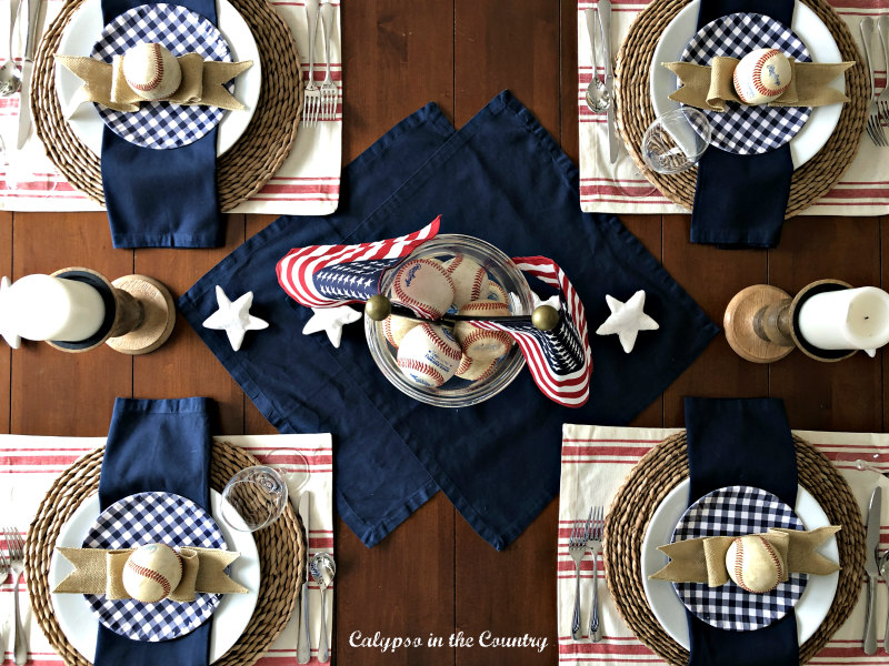 Patriotic Tablescape with Old Baseballs - how to decorate a sophisticated baseball themed table...great for birthdays or Father's Day! #patriotictable #baseballthemedtable