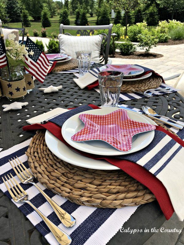 Red white and blue flag themed tablescape on the patio