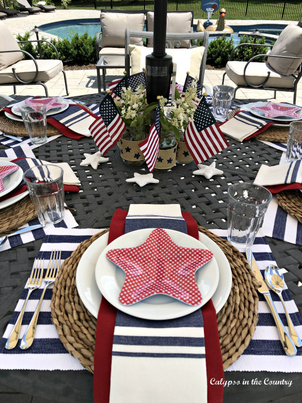 Stars and stripes patriotic tablescape on the patio