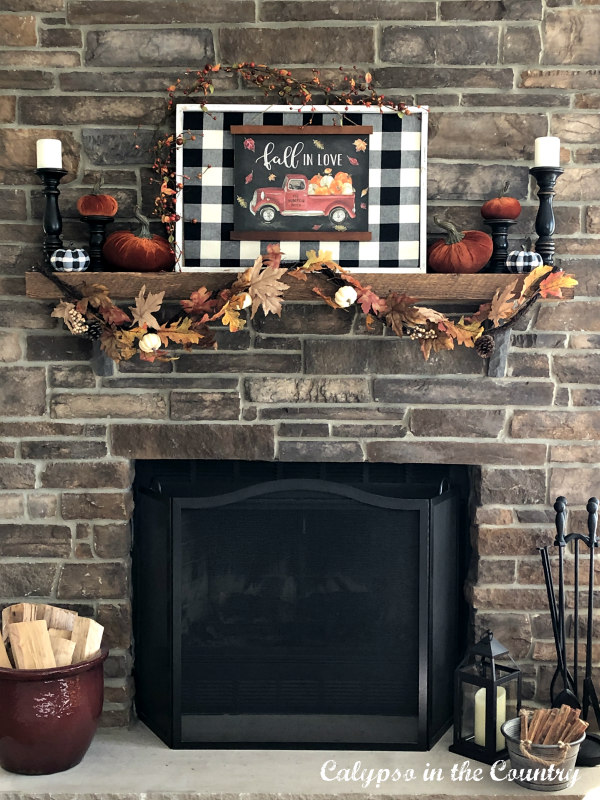 Rustic Stone Fireplace with Buffalo Check Fall Decor