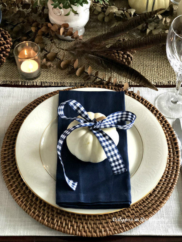 Navy and White Thanksgiving place setting in a navy dining room