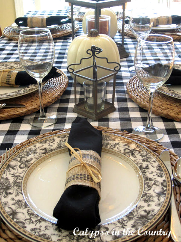 Black and White fall table setting with buffalo check tablecloth