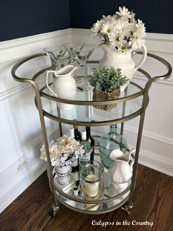 Gold spring bar cart with flowers