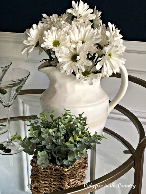 Daisies in white pitcher - spring bar cart styling
