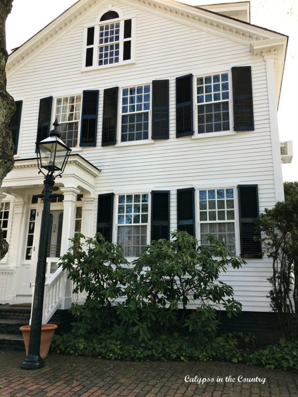 White house with black shutters - classic New England style