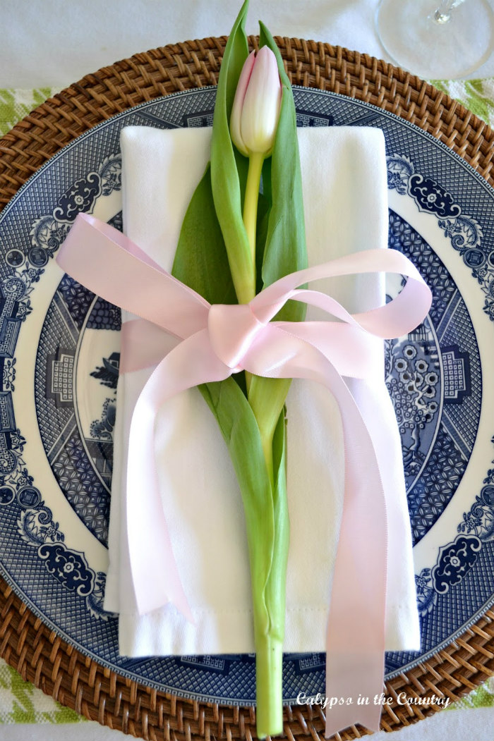 Tulip on napkin with pink ribbon