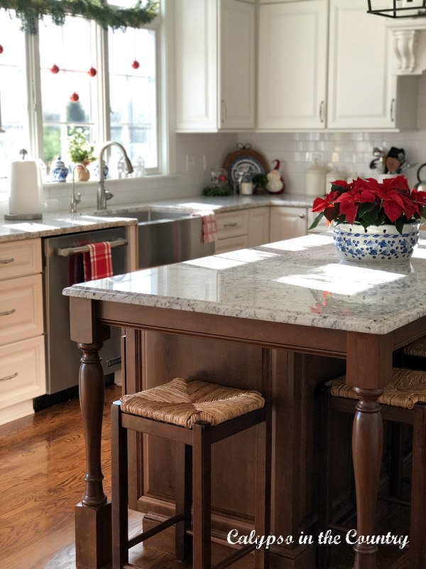 Kitchen island and red Christmas decorations 