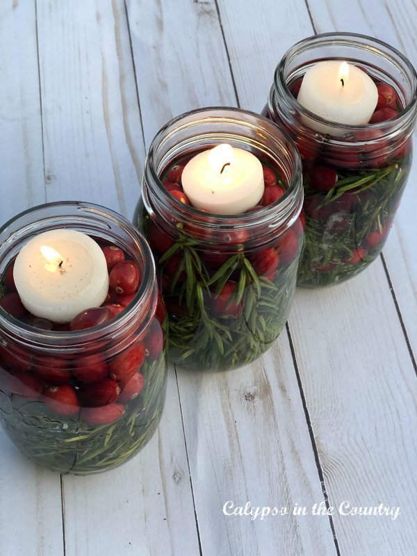 Cranberry luminaries in mason jars - easy Christmas vase filler ideas