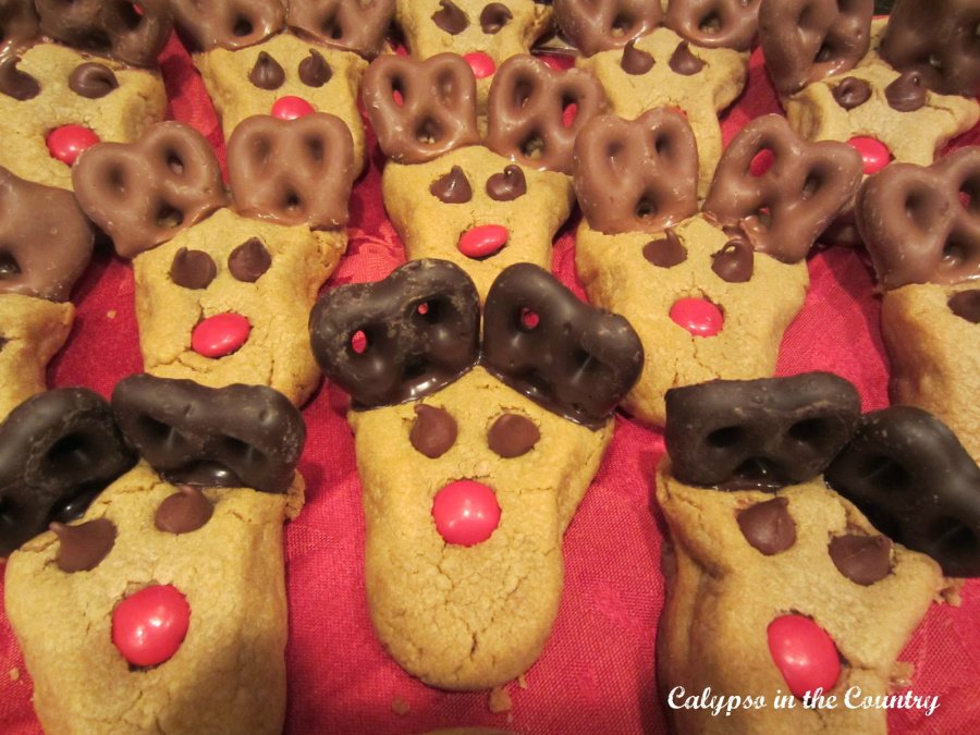 peanut butter reindeer cookies with chocolate covered pretzel antlers - special holiday traditions