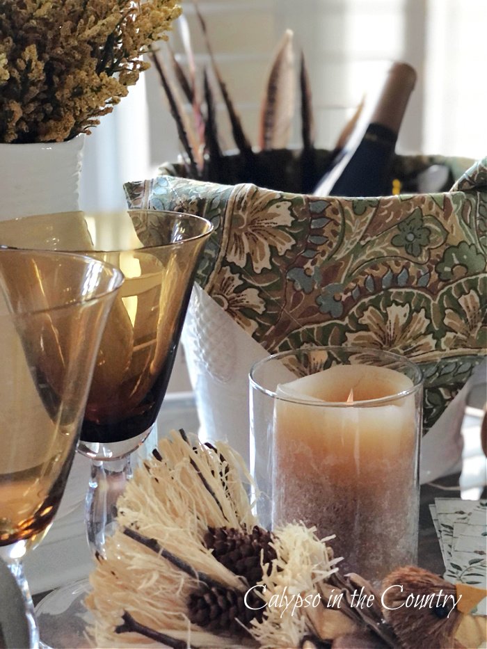 Amber wine glasses and ice bucket on Thanksgiving bar cart
