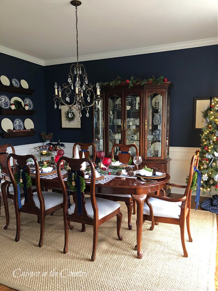 navy blue dining room styled for Christmas