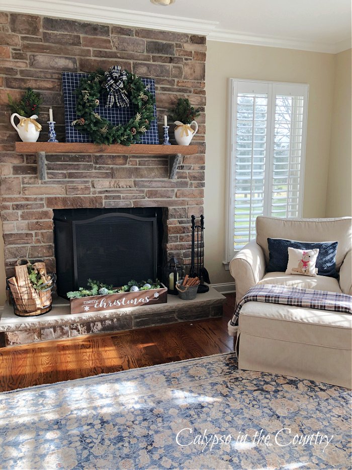 stone fireplace decorated for Christmas - best of 2021 countdown