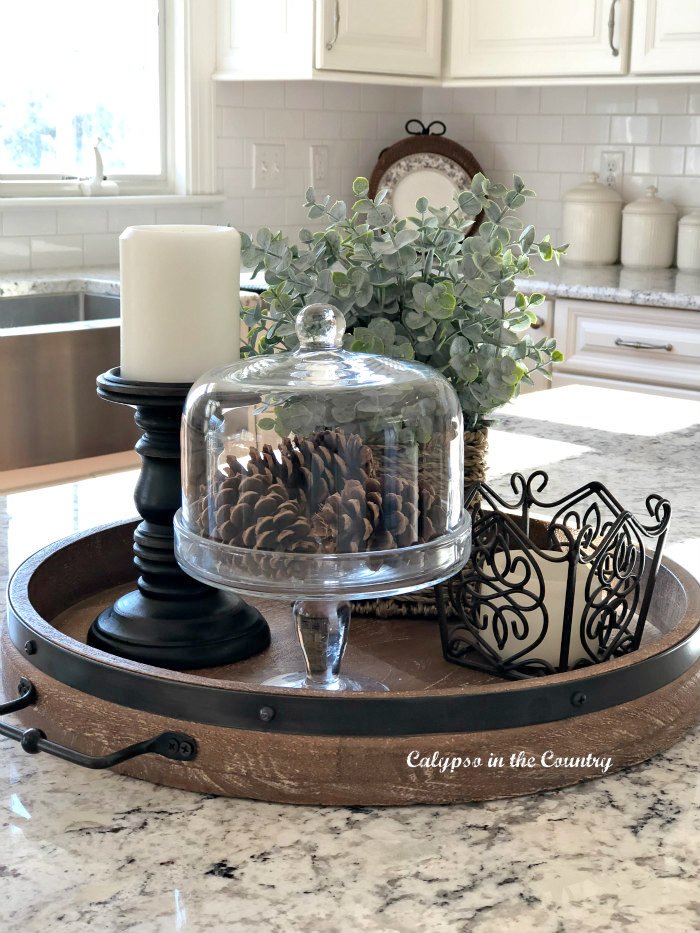 Round wooden tray decorated in kitchen