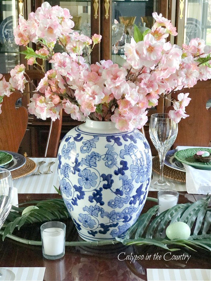 blue and white vase with cherry blossoms - Easter decorations ideas
