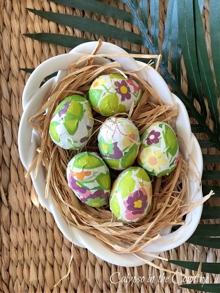Decoupaged Easter eggs in white basket bowl - Hello April ideas
