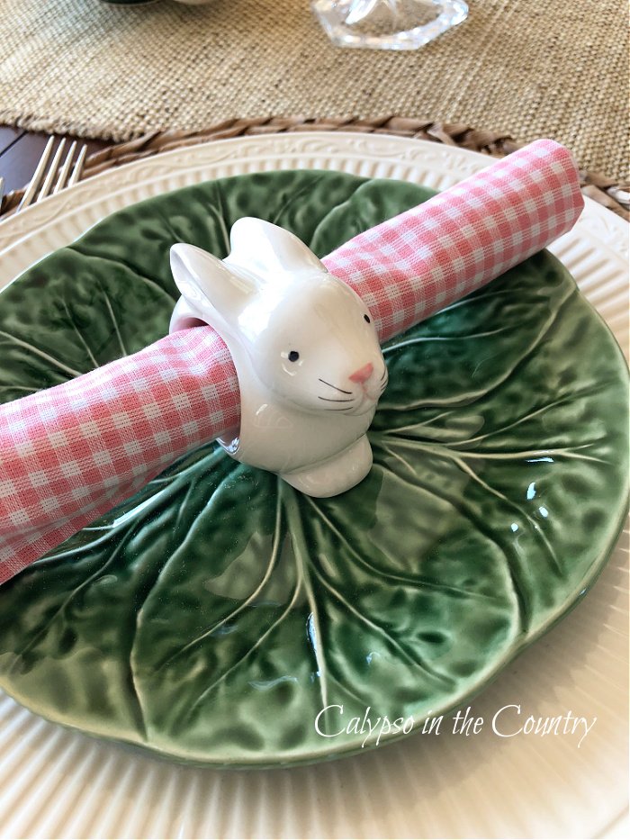 bunny napkin ring with pink gingham napkin on green plate - decorating for Easter ideas