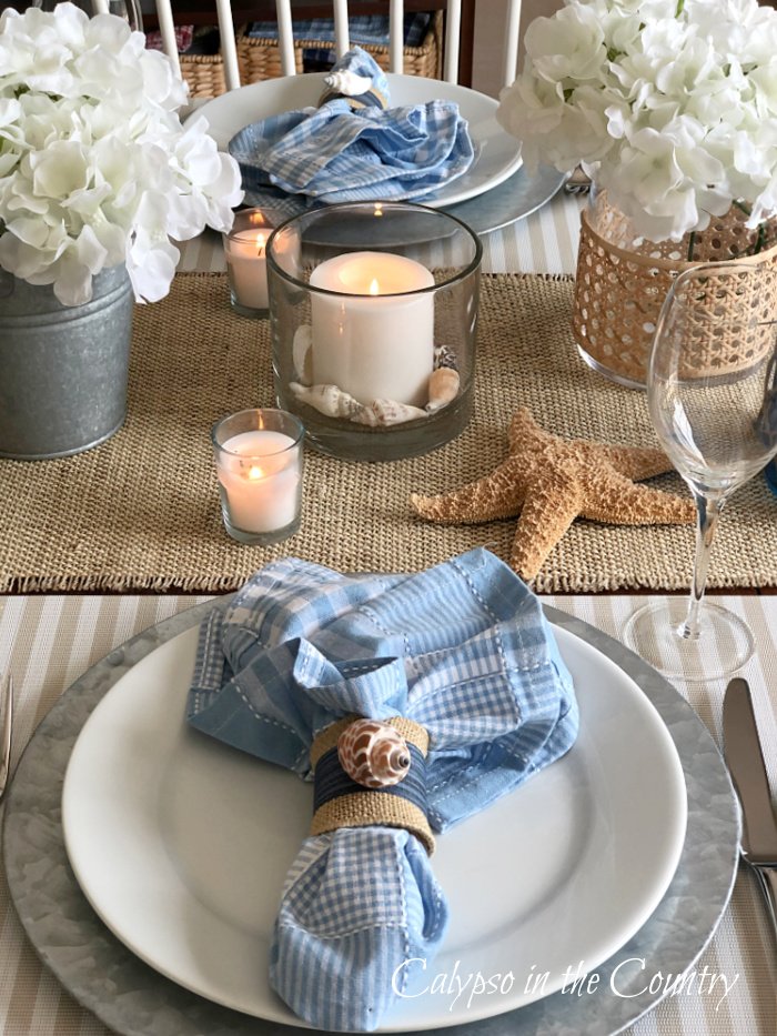 place settings with blue napkins and coastal decor 