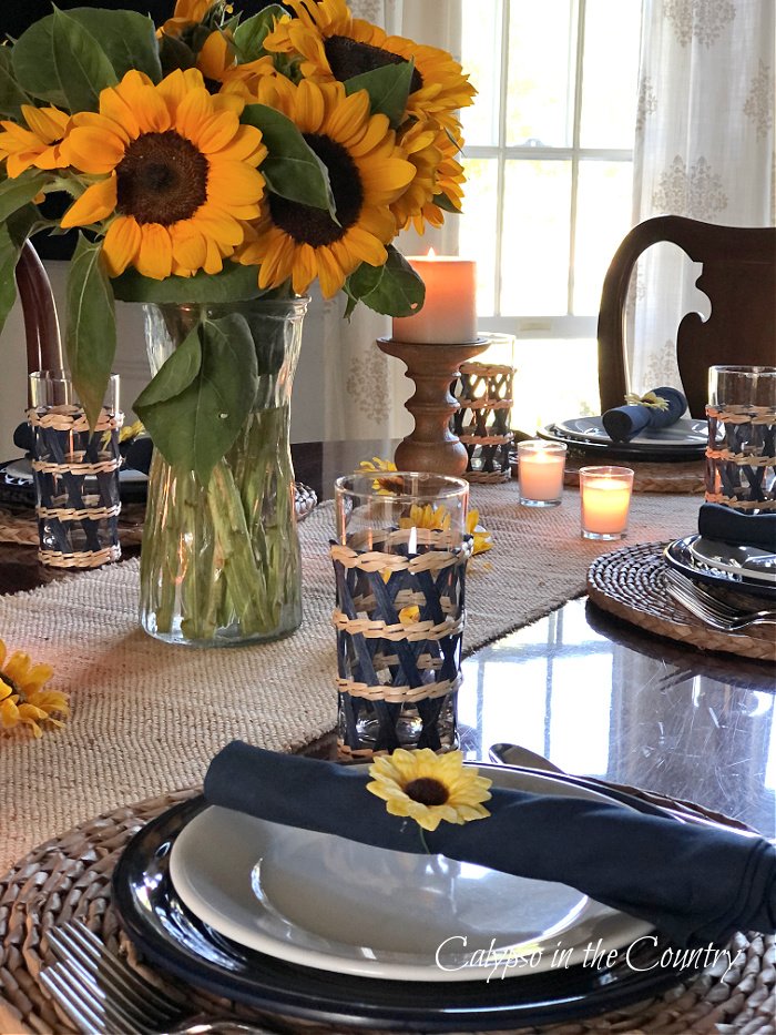 Sunflower in glass vase and table settings - decorating with sunflowers in the fall