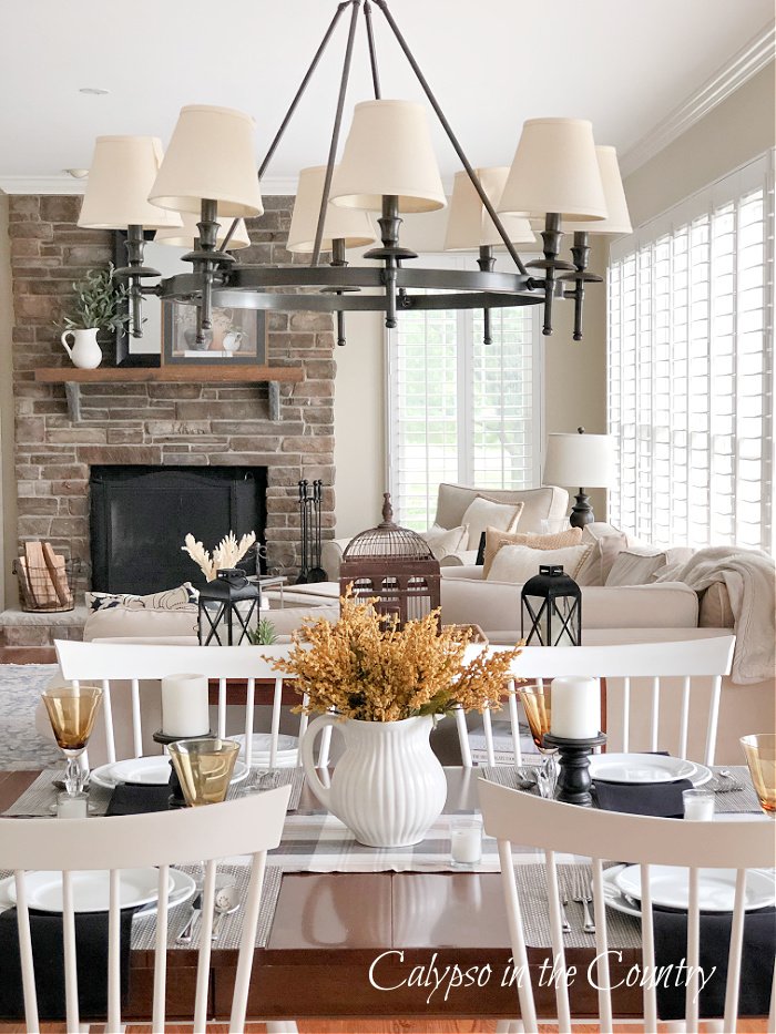 table setting in open concept kitchen - neutral fall decor ideas