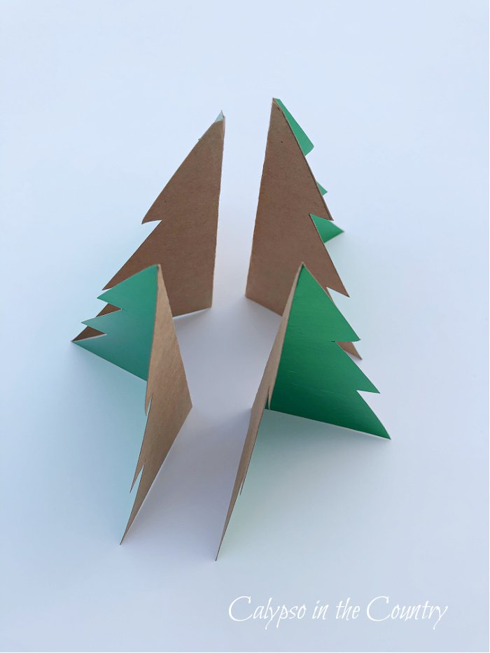 Four folded cardstock paper christmas trees - diy decorations