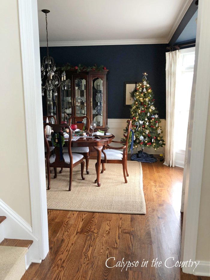 Navy dining room with blue Christmas tree decorating ideas