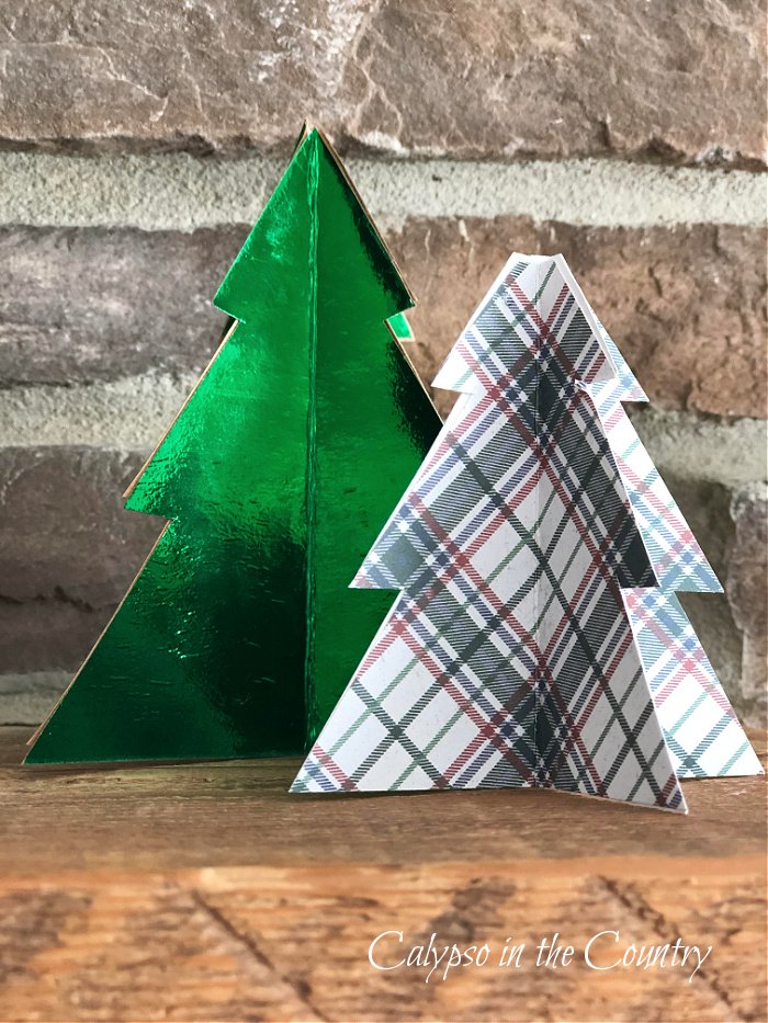 Green and plaid card stock Christmas trees on fireplace mantel - diy paper christmas decorations