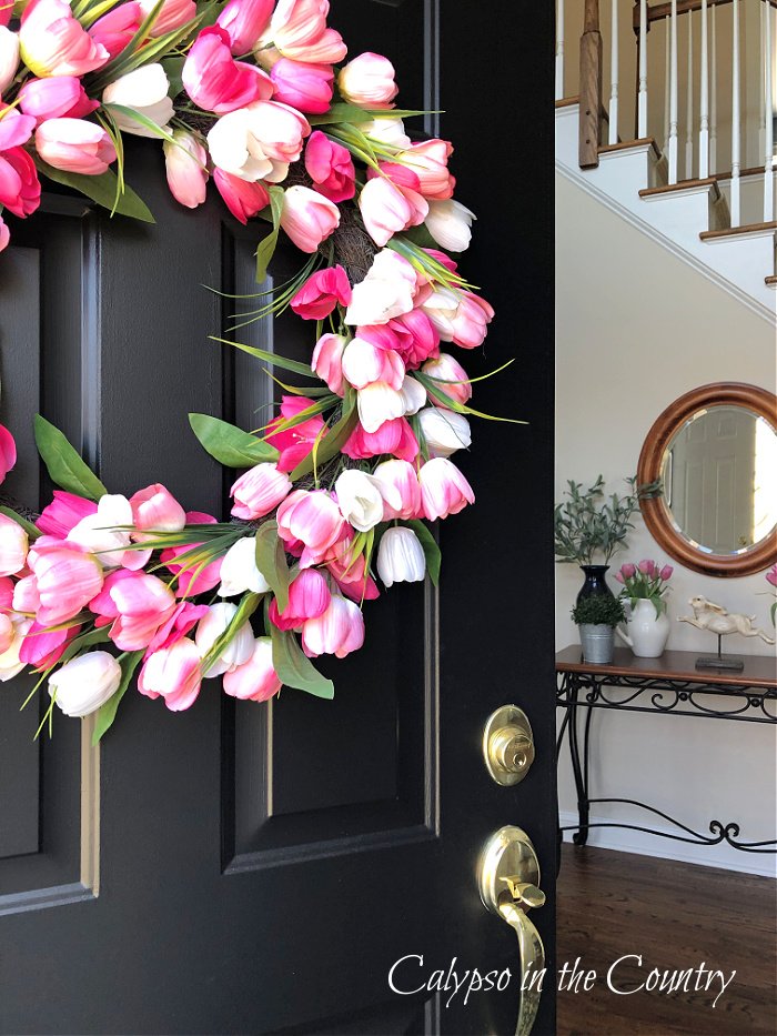 Pink tulip wreath on black front door - spring door decor 