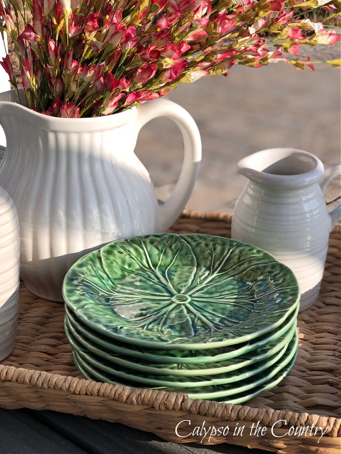 Seagrass tray with white pitchers and green cabbage leaf salad plates - spring tablescapes 