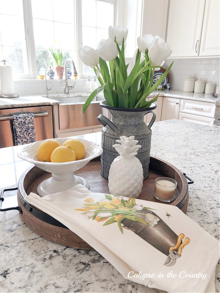 Wooden tray with tulips and lemons - spring kitchen island decorating ideas