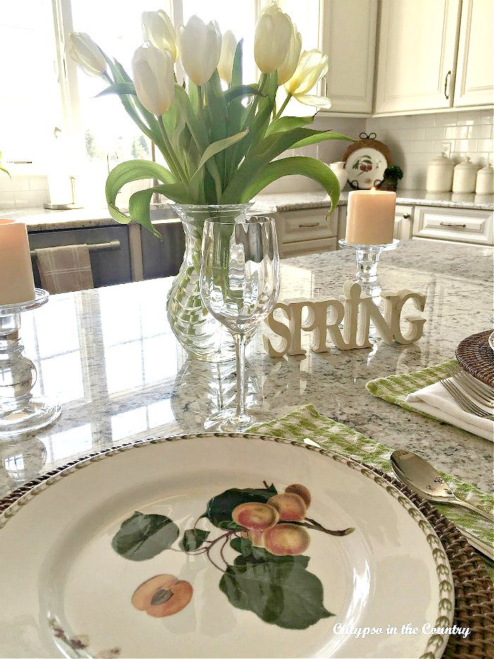 White tulips and fruit plates - spring kitchen island decorating ideas