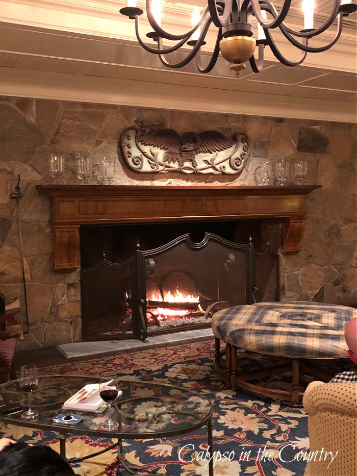 Stone fireplace in Woodstock Inn lobby - April Highlights