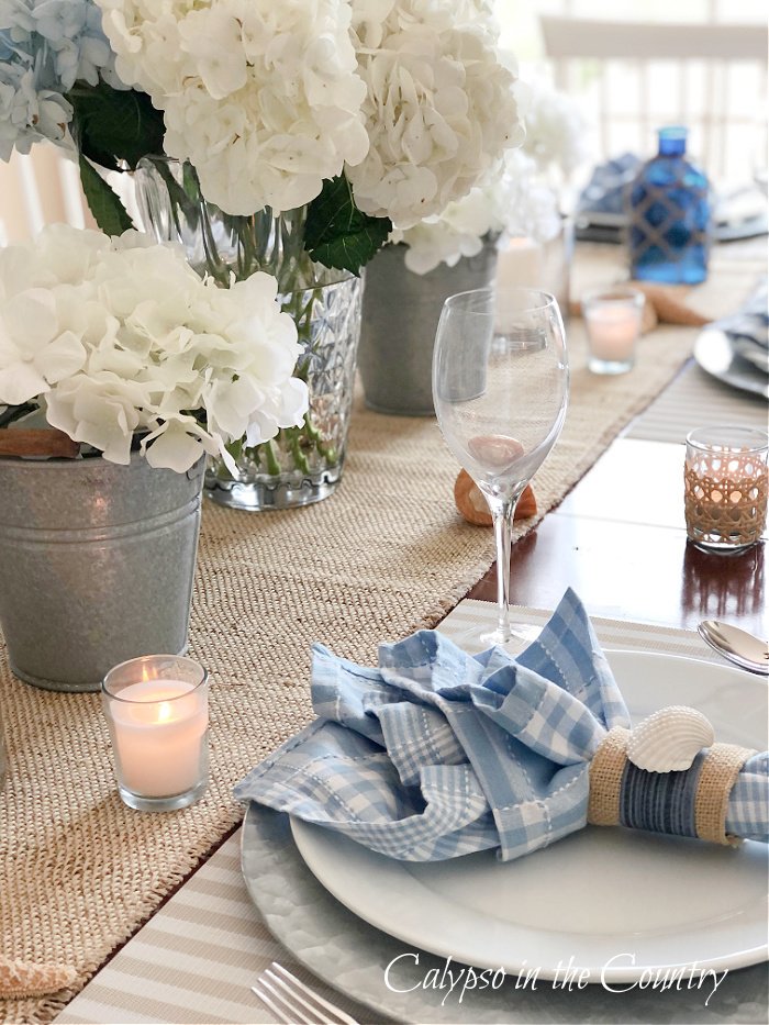 Blue and White coastal table setting with hydrangeas - goodbye May hello June