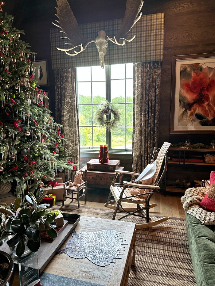 Christmas tree next to window in rustic room - Happy Christmas in July ideas