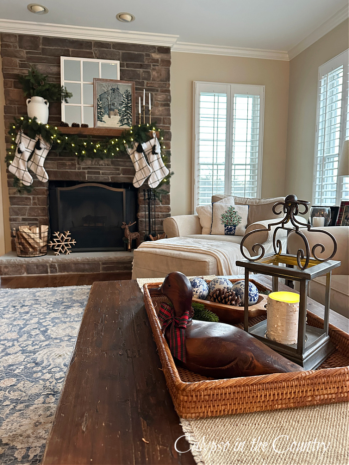 Christmas family room with stone fireplace - Ralph Lauren Christmas House Tour