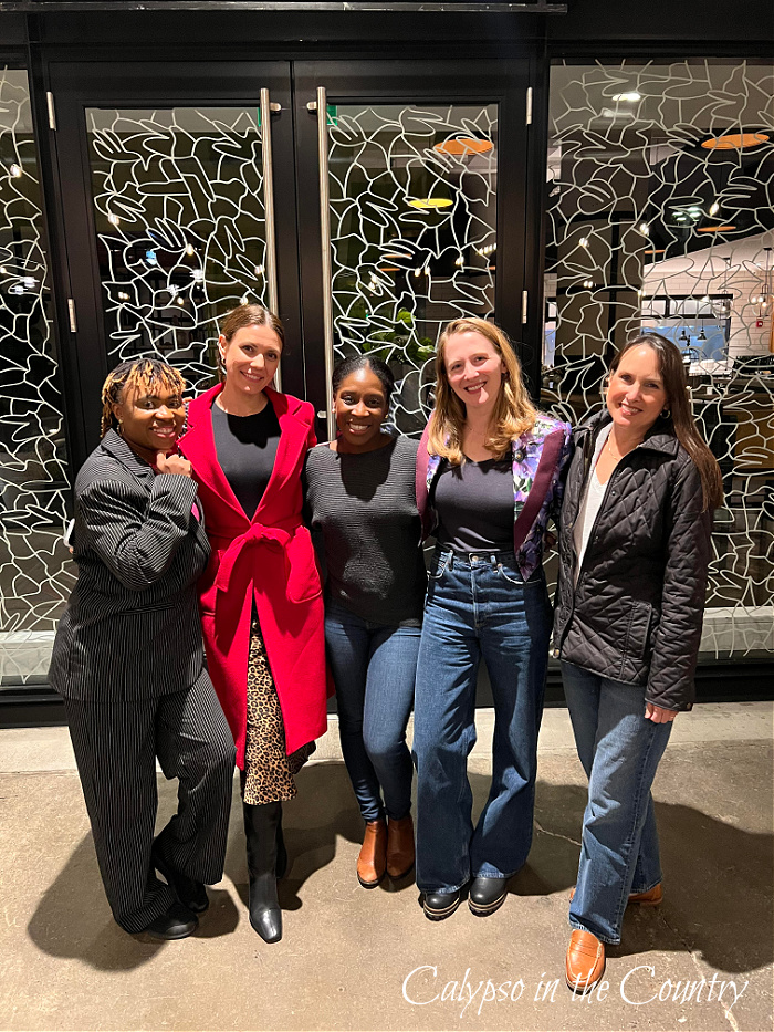 Five women posing in front of restaurant - November recap