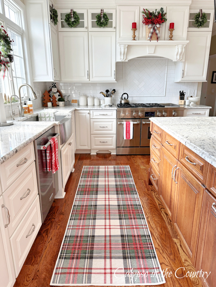 Plaid rug runner in white kitchen - Ralph Lauren Christmas Dining room and tour